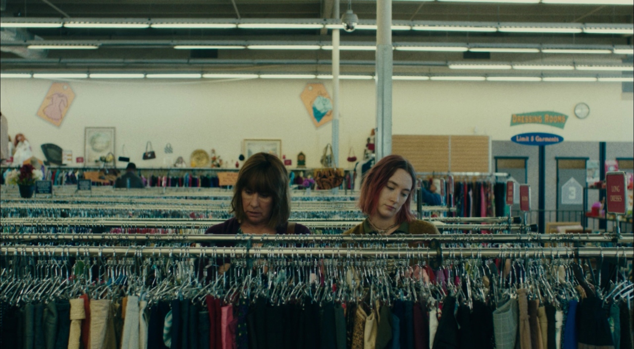 What Is a Coming-of-Age Movie? Definition Themes & Film Examples 5 Lady Bird and her mother looking through racks at a thrift store