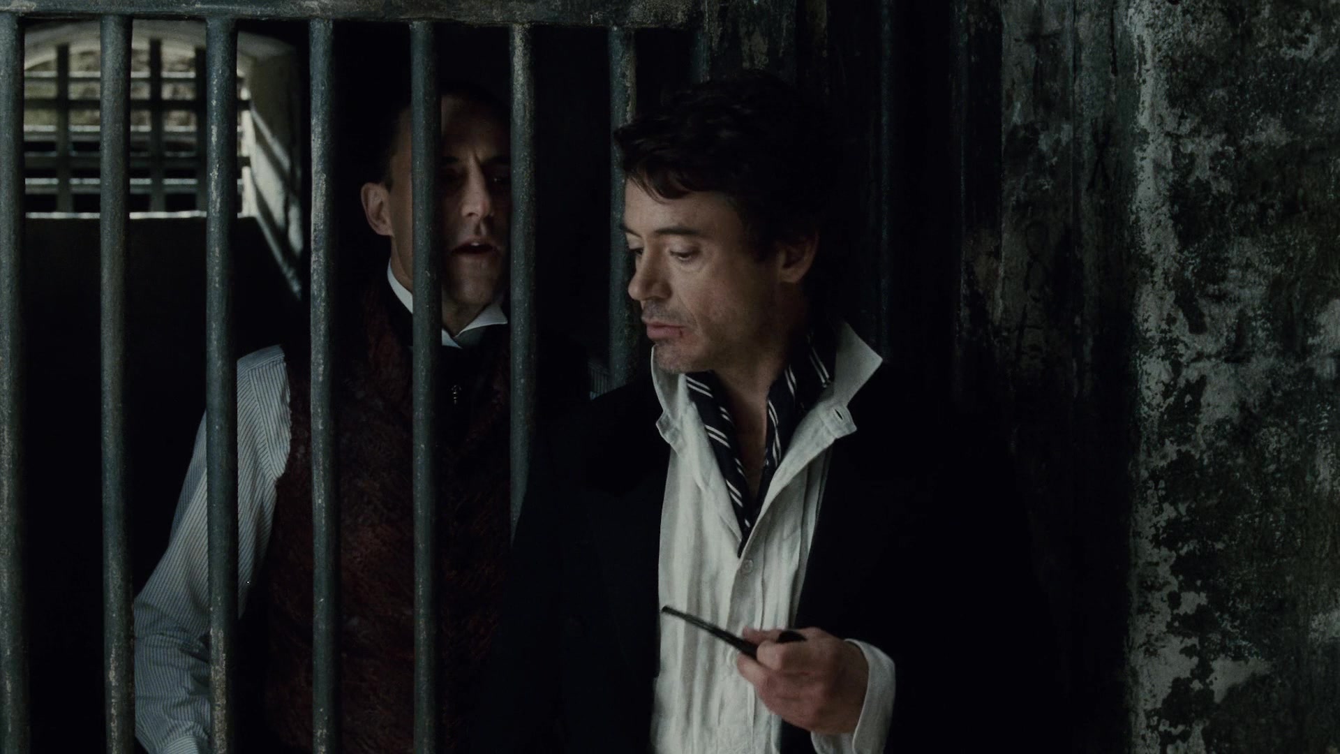 What Are the Rhetorical Appeals? Definition + Ethos, Pathos, Logos in Film & Ads 7 Sherlock Holmes confronts Lord Blackwood through prison bars in Sherlock Holmes (2009).
