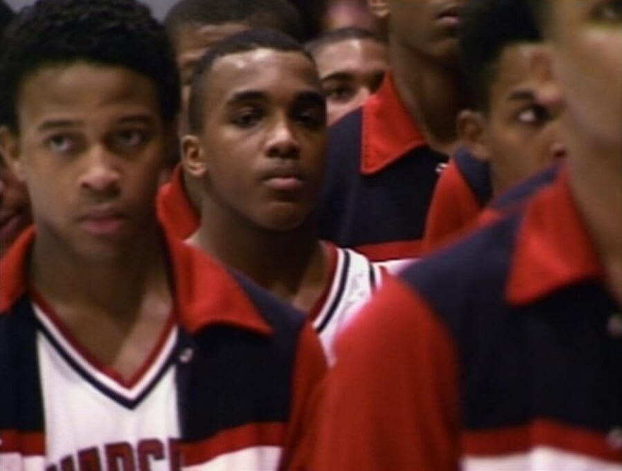 30 Films Every Budding Film Student Should Watch & Why 31 Close-up of a young basketball player standing among teammates in matching warm-up jackets.