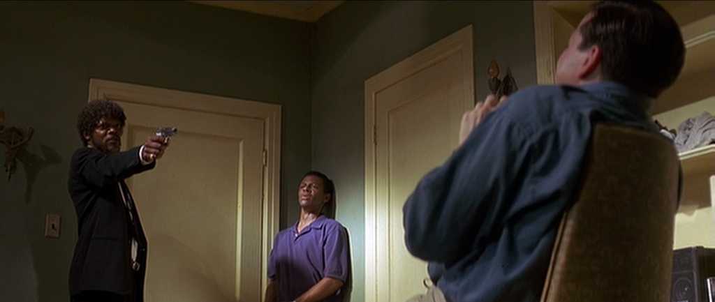 10 Best Gangster Movies of All Time For Filmmakers To Watch 7 Jules points a gun at a terrified man sitting in a chair while another man stands nervously beside him