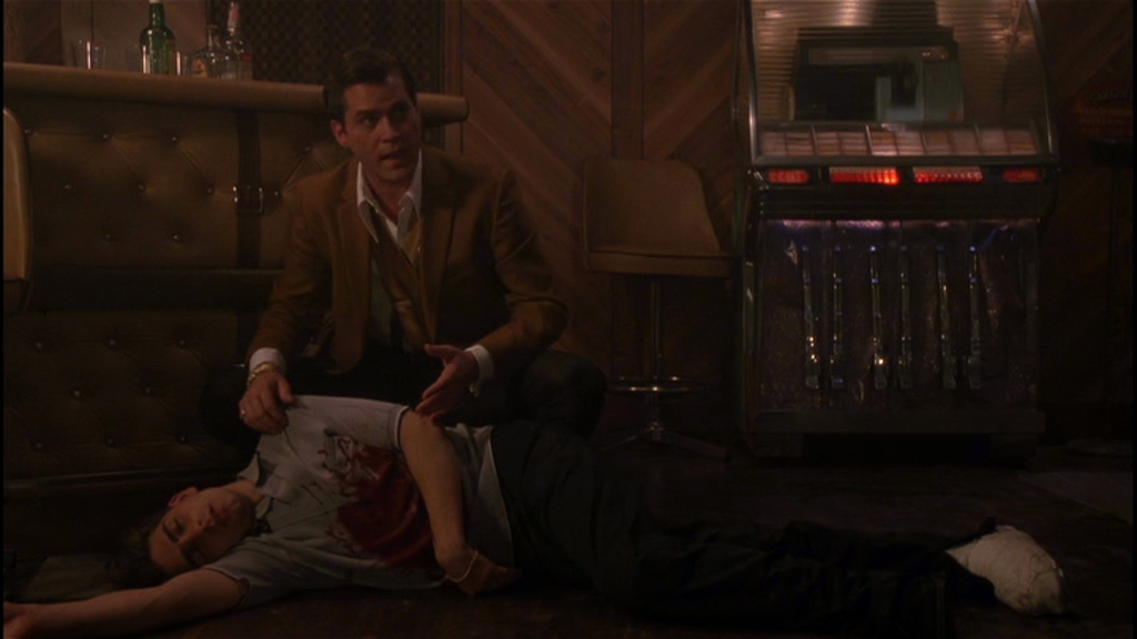 10 Best Gangster Movies of All Time For Filmmakers To Watch 5 Henry kneels beside a friend’s body on the bar floor, blood soaking his shirt