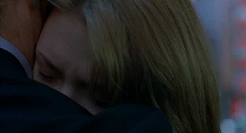 Denouement in Film. Meaning, Definition, and Examples 6 Bob (Bill Murray) whispers to Charlotte (Scarlett Johansson) in a street crowd at the end of Lost in Translation.