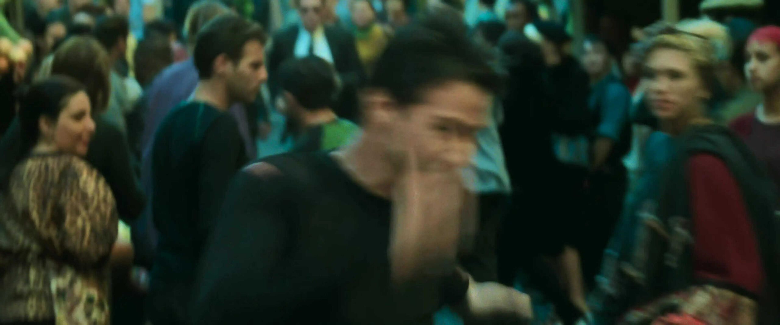 What is Campbell's Monomyth? A Hero Guide for Filmmakers 15 Neo dashes through a blur of people on a city street, fleeing after fighting Agent Smith.