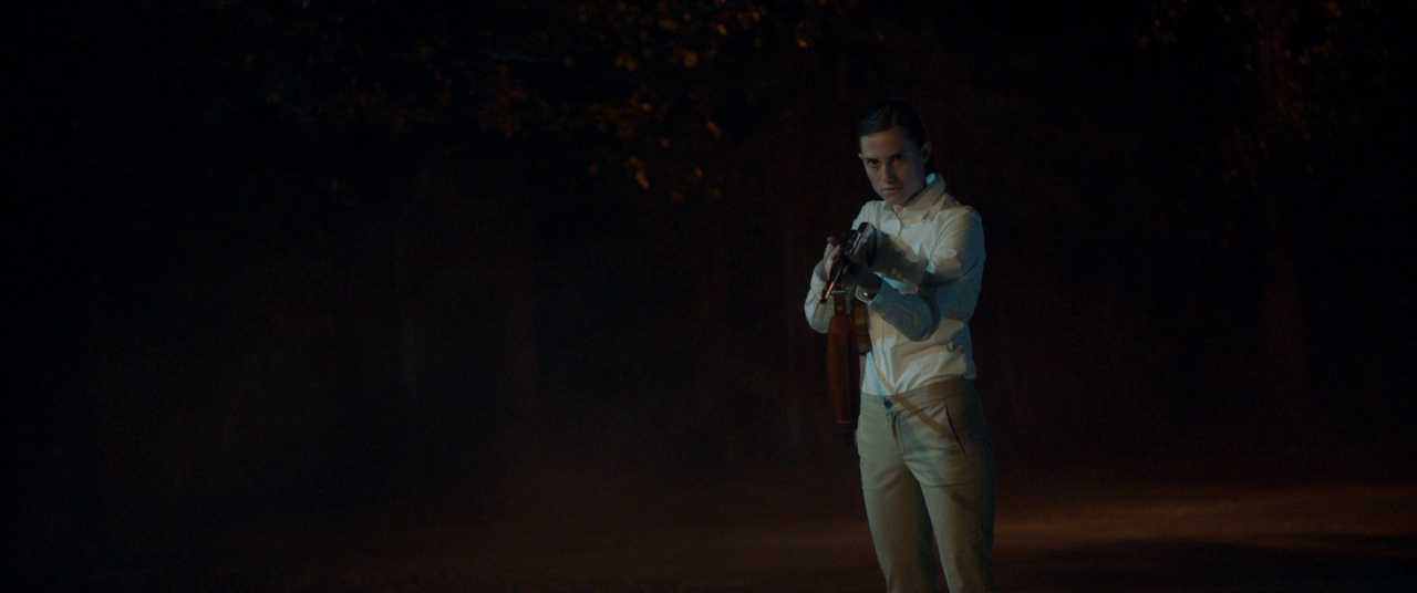 Climax in Film. Definition and Examples From Famous Movies. 7 Georgina stands in the road at night holding a shotgun in her white outfit
