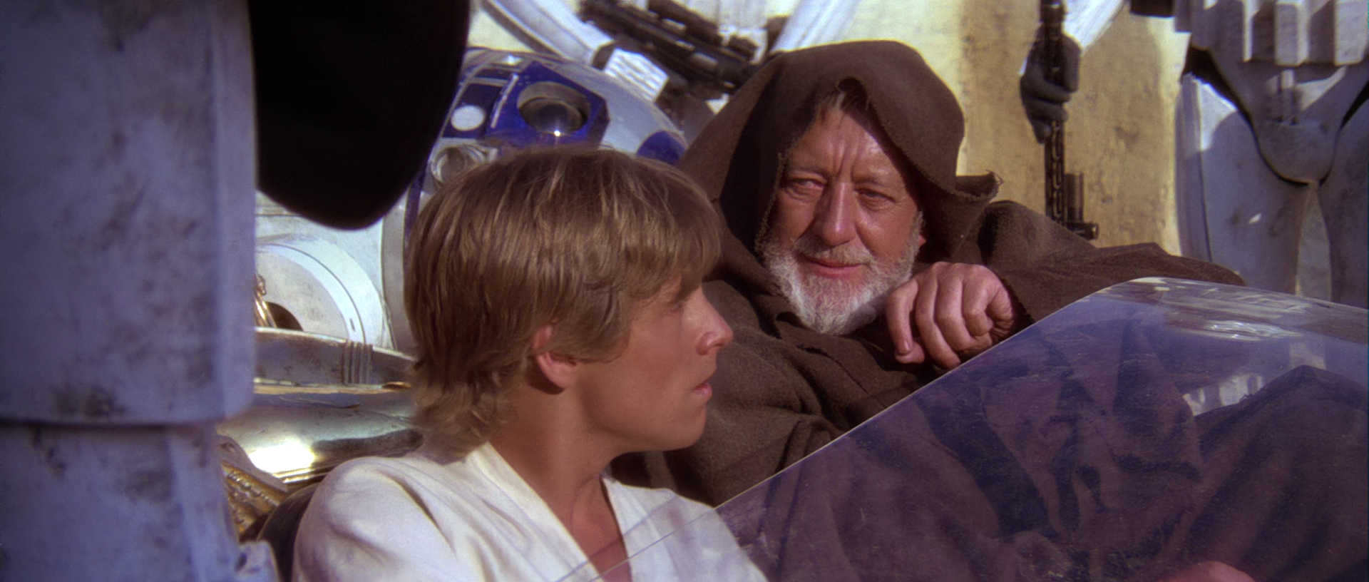 What is The Hero’s Journey? Story Structure Explained with Star Wars 5 Obi-Wan calmly speaks to stormtroopers while Luke sits beside him in a landspeeder, witnessing the Jedi mind trick for the first time.