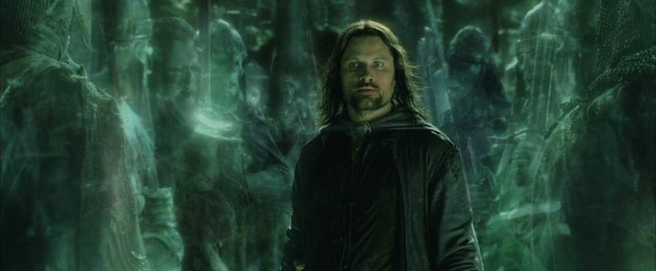 Deus ex Machina in Film & Literature. Definition & Examples. 5 Aragorn stands in a dim, green-lit cavern while translucent ghost soldiers surround him on both sides.