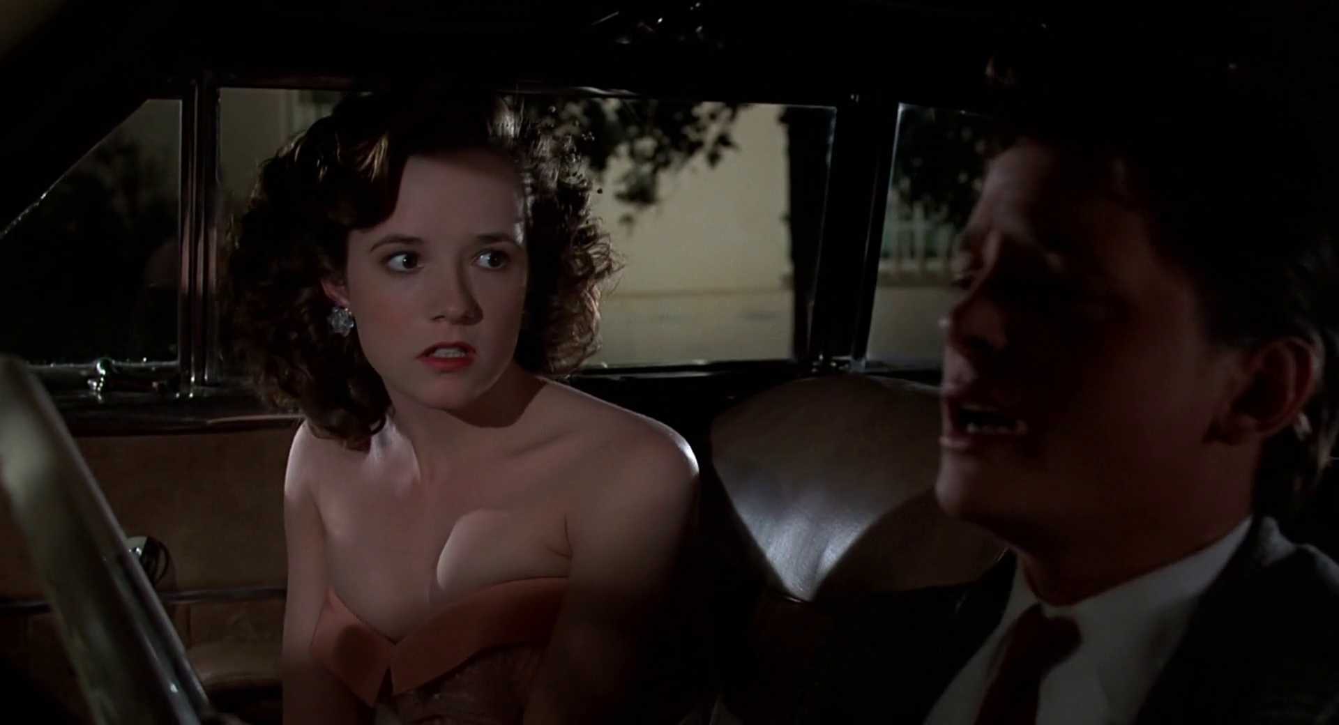 Paradox in Film: Definition, Types, and Movie Examples 4 Marty McFly sits in a car beside his young mother, who looks shocked and confused during their conversation.