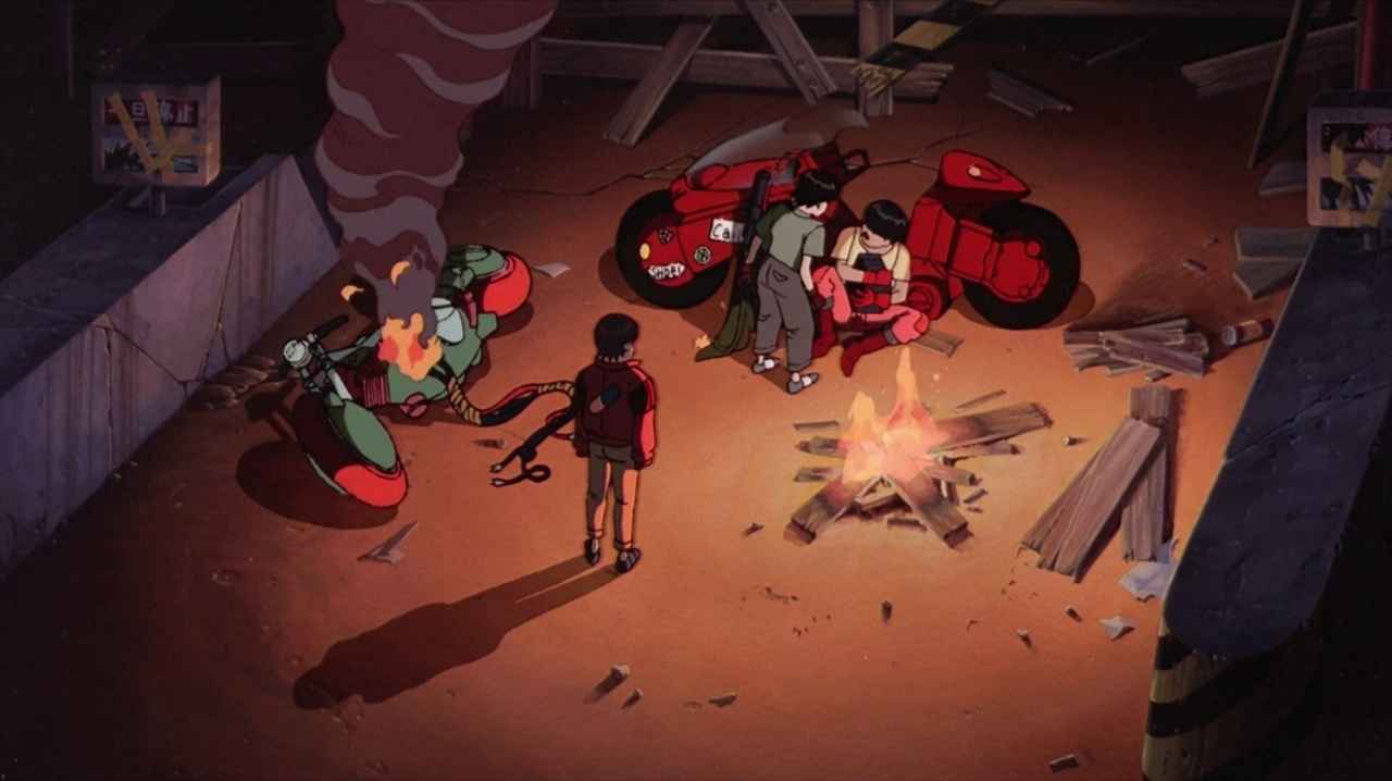 What is Cyberpunk in Film? Definition and Examples 10 Animated scene showing a group of teenagers gathered around a fire with damaged motorcycles, one of them smoking, in a ruined urban construction site.