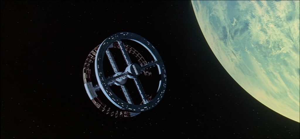 What is Intertextuality? Definition, Examples & How to Use it 4 Circular space station floating above Earth in 2001: A Space Odyssey (1968)