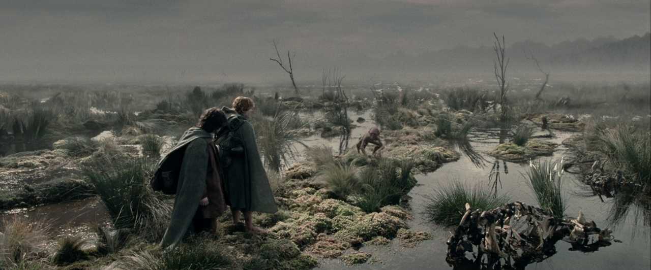 What is Characterization? Elements Defining Your Characters 8 Frodo and Sam stand on a bleak marshland path while Gollum crouches ahead near shallow water under a gray sky.
