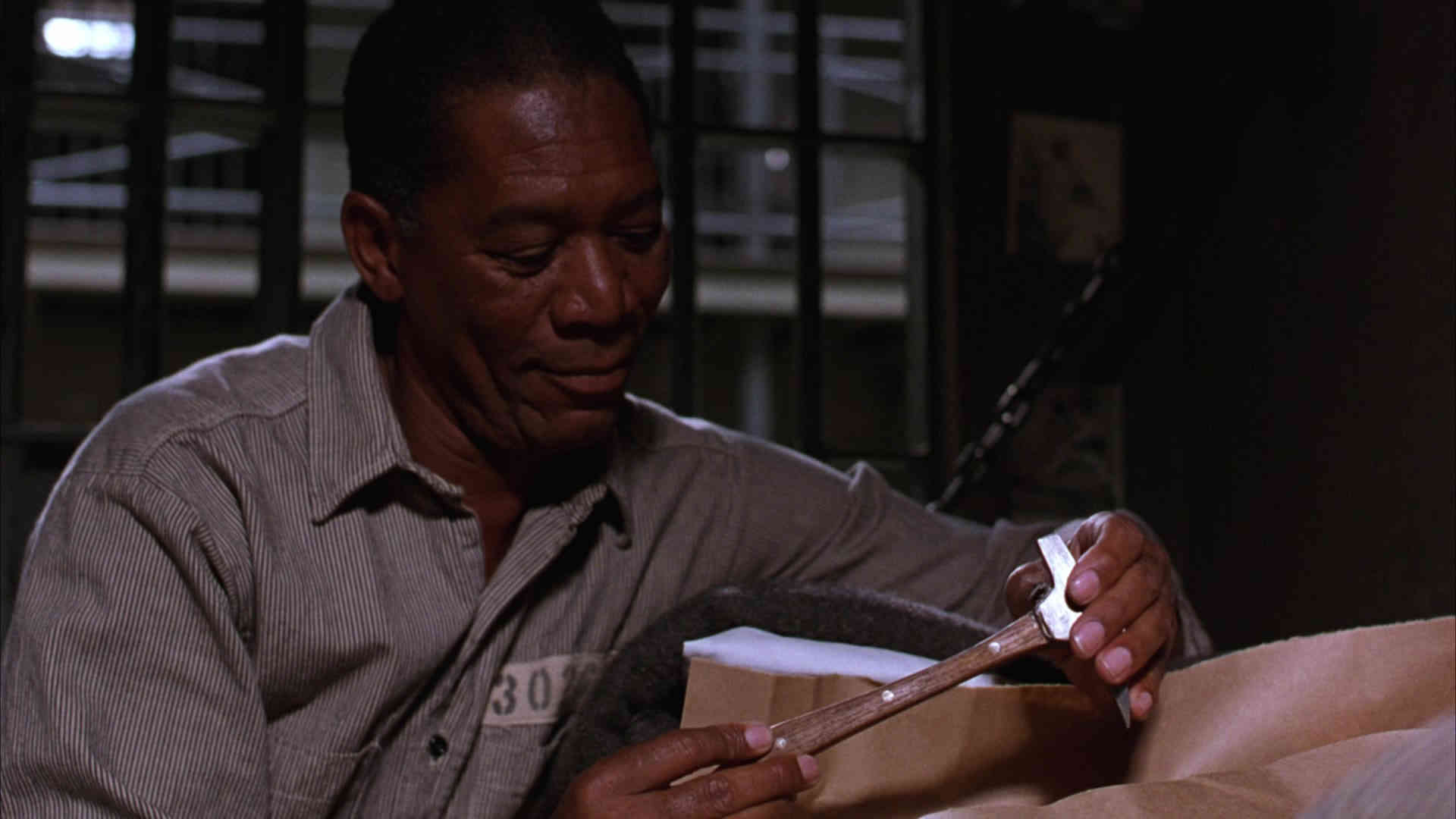 Narrator Types Explained. Definition and Examples from Film 3 Ellis Boyd “Red” Redding (Morgan Freeman) sits in a prison setting and examines a small rock hammer as he holds it over a box.