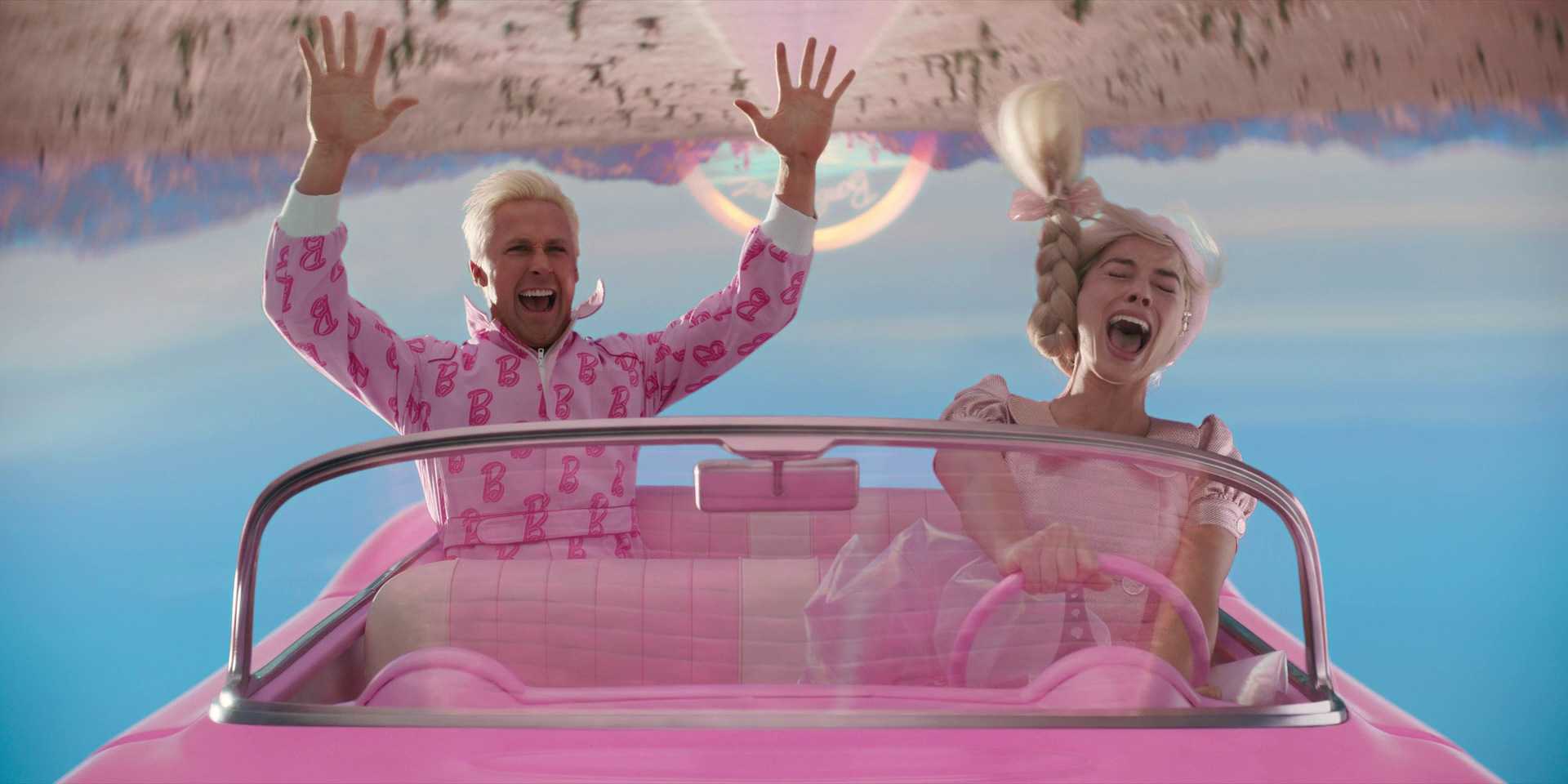Film Theory: Definition, Discourses, and How to Use It 6 Barbie and Ken ride in a pink car, screaming and throwing their hands up in Barbie