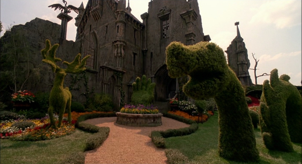 What Is Gothic Art? Definition, History & Examples 23 Gothic-style castle with whimsical topiary garden from Tim Burton’s Edward Scissorhands