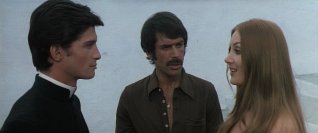 What Are Giallo Films? Definition, History & Key Examples 10 Three characters talking in a rural setting in Don’t Torture a Duckling (1972)