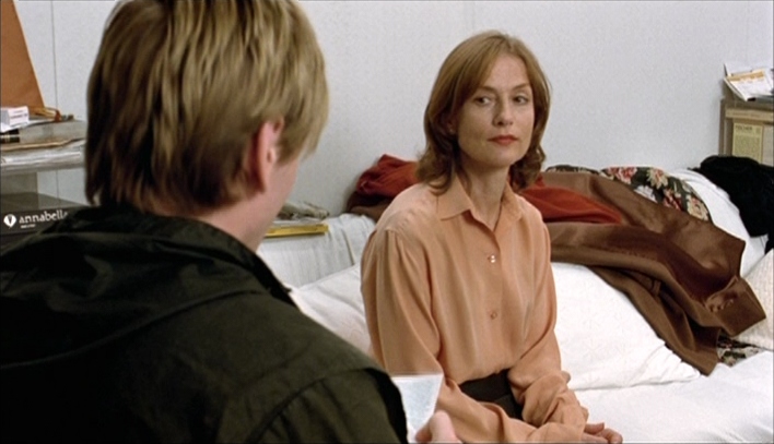What Is Erotic Cinema? Definition, Genre & Global Examples 9 Erika sits on a bed and watches Walter read her letter in The Piano Teacher (2001, MK2), a scene that shifts their relationship into darker territory.