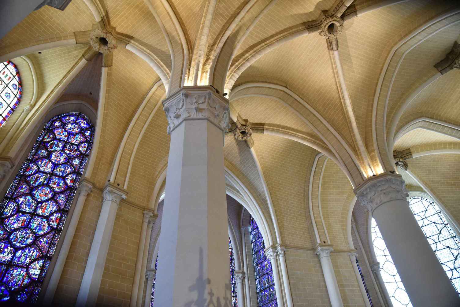 What Is Gothic Art? Definition, History & Examples 11 Vaulted Gothic ceiling and stained glass inside Saint-Ouen Abbey Church
