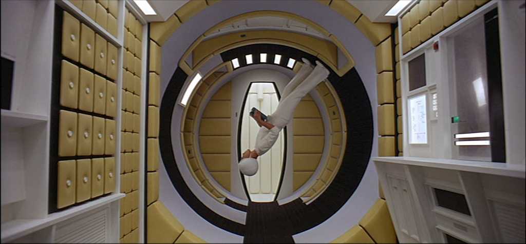 What Is Science Fiction? Definition & Film Origins Explained 7 An astronaut floats weightlessly inside a circular spaceship corridor in 2001: A Space Odyssey (1968).
