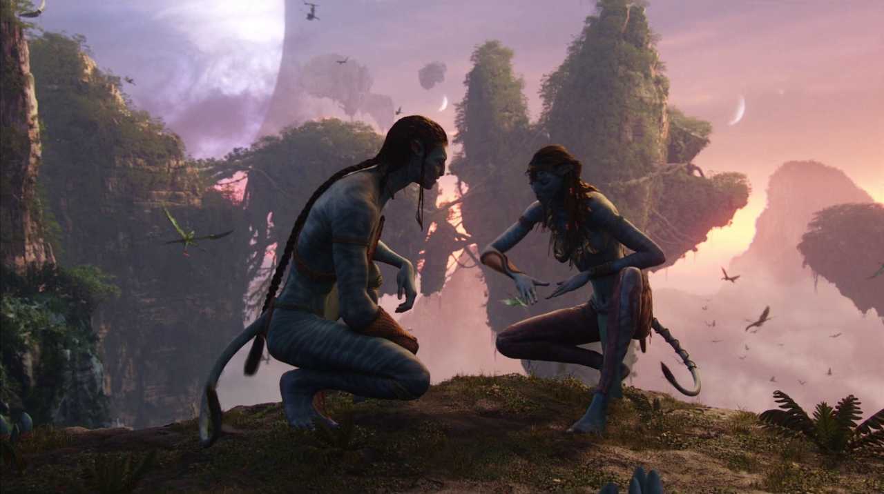 What Is Science Fiction? Definition & Film Origins Explained 15 Two Na’vi characters kneel on a cliff in the alien world of Pandora in Avatar (2009).