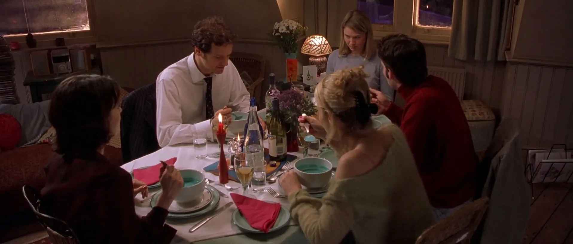 What is a Romcom? Definition, History & Tropes 9 Bridget and her friends eat blue soup around a candlelit dinner table in Bridget Jones’s Diary (2001)