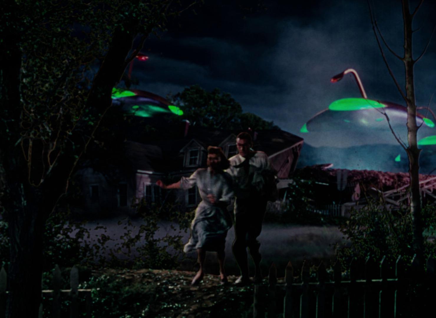 What Is Science Fiction? Definition & Film Origins Explained 5 A man and woman flee as glowing alien war machines attack a house in The War of the Worlds (1953).