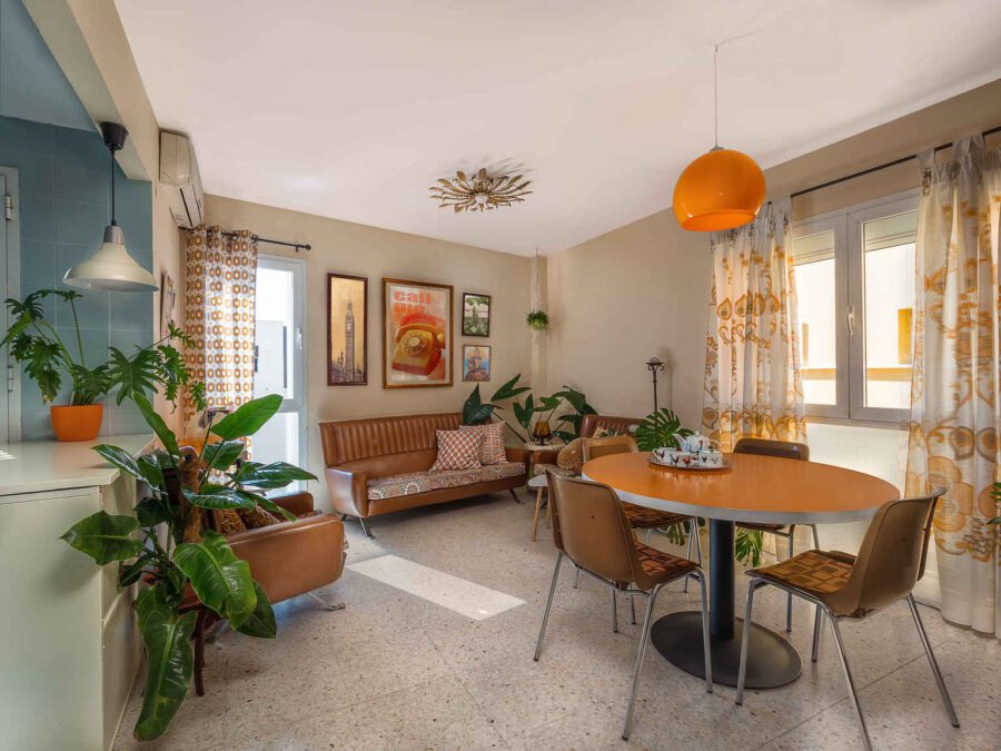 What Does a Set Decorator Do? Duties, Skills, Career Path & How to Start 2 1970s Living Room/Dining Space
