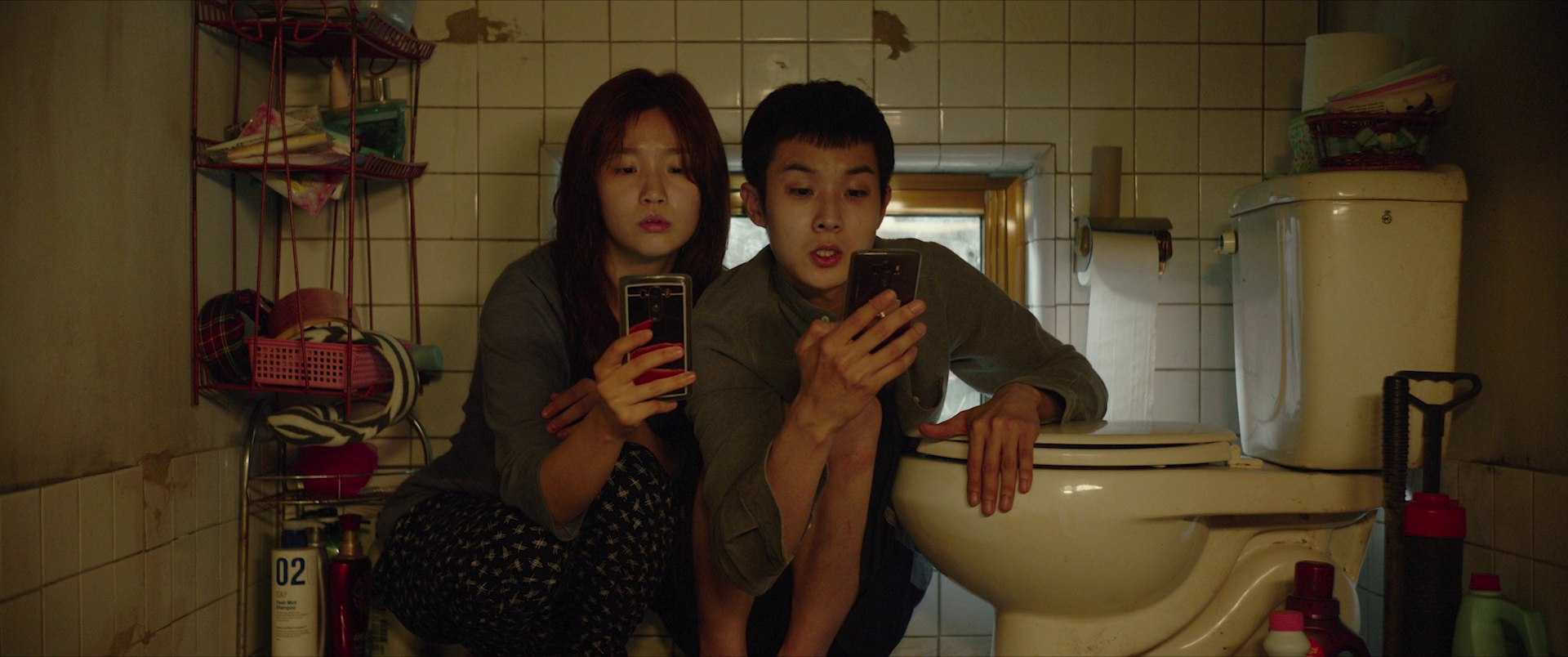 What is Characterization? Elements Defining Your Characters 5 Parasite (2019) still – Kim family crouched in cramped semi-basement bathroom