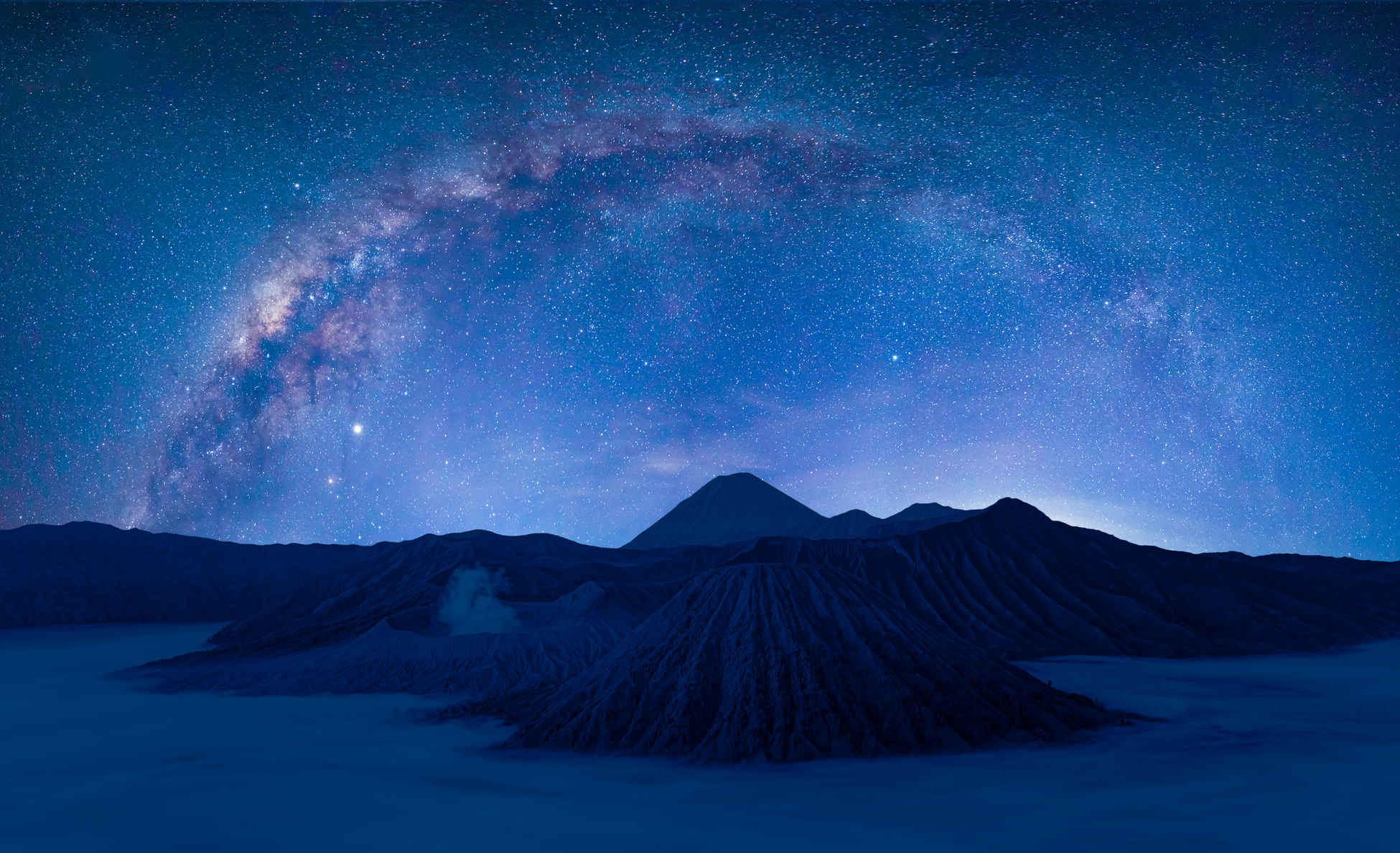 Types of Photography: Genres, Styles & Techniques Explained 4 Milky Way arcing over Mount Bromo at night, captured with long exposure