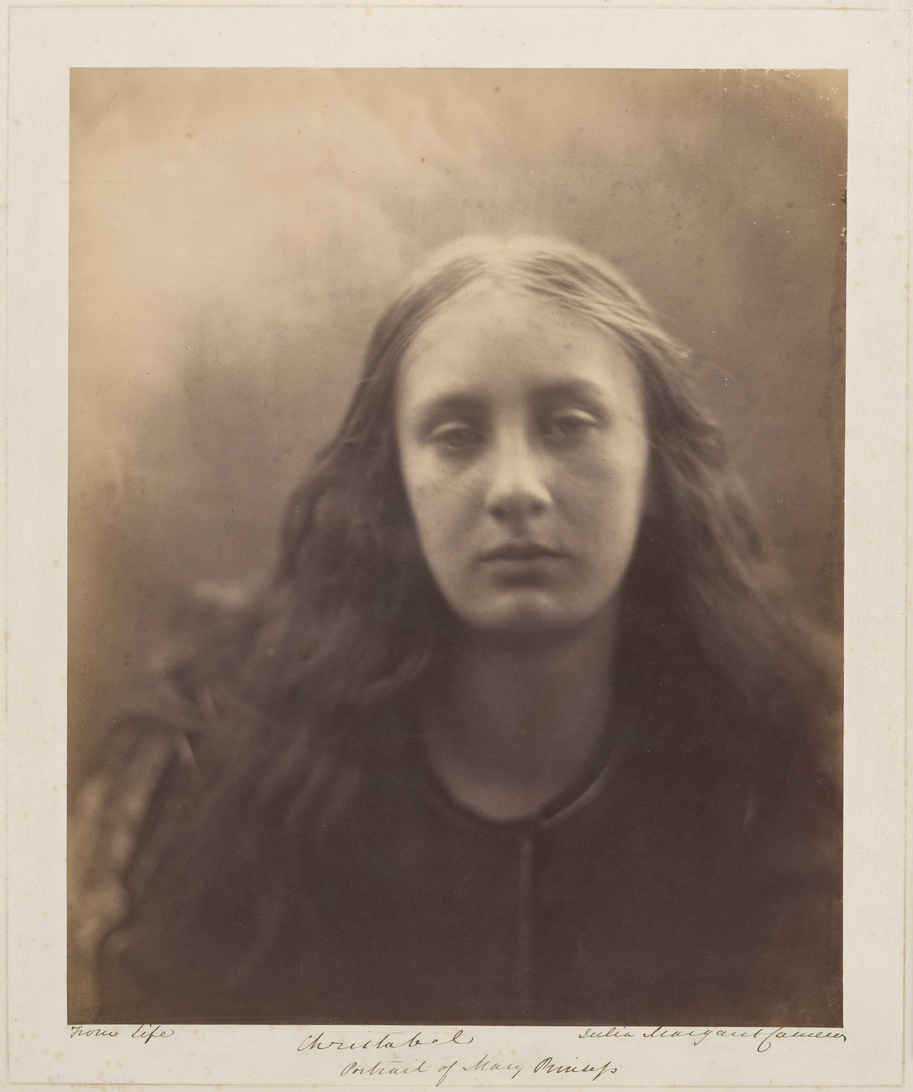 Soft Focus in Photography& Film: How to Get that Dreamy Look 4 Soft-focus portrait of a young woman with long hair, her expression calm and serious. The image is intentionally blurred at the edges.