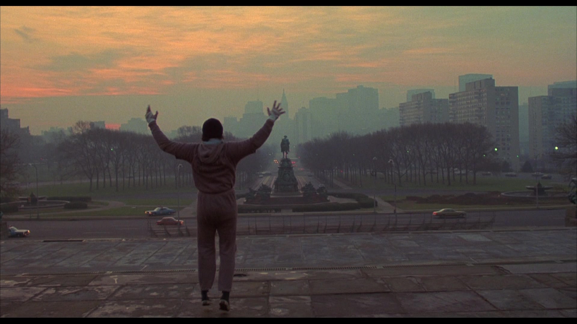 What Is a Visual Metaphor? Definition & Examples 5 Rocky stands at the top of the Philadelphia Museum steps with arms raised