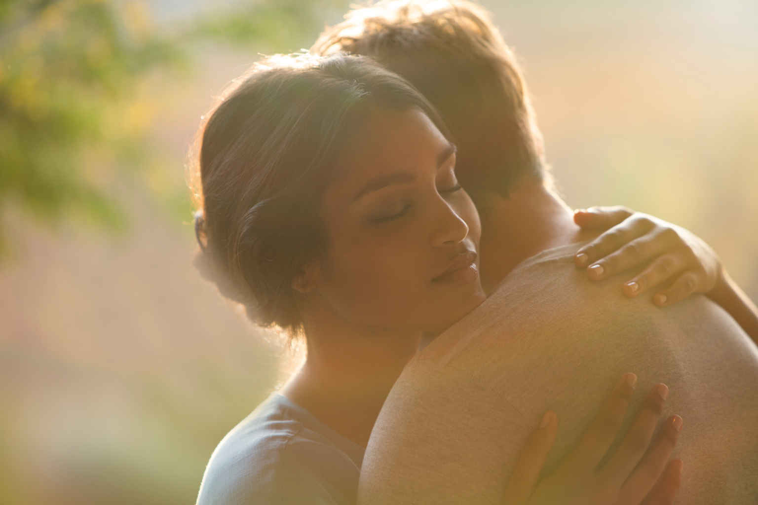 Soft Focus in Photography& Film: How to Get that Dreamy Look 2 Smiling woman photographed through a soft, misty filter effect