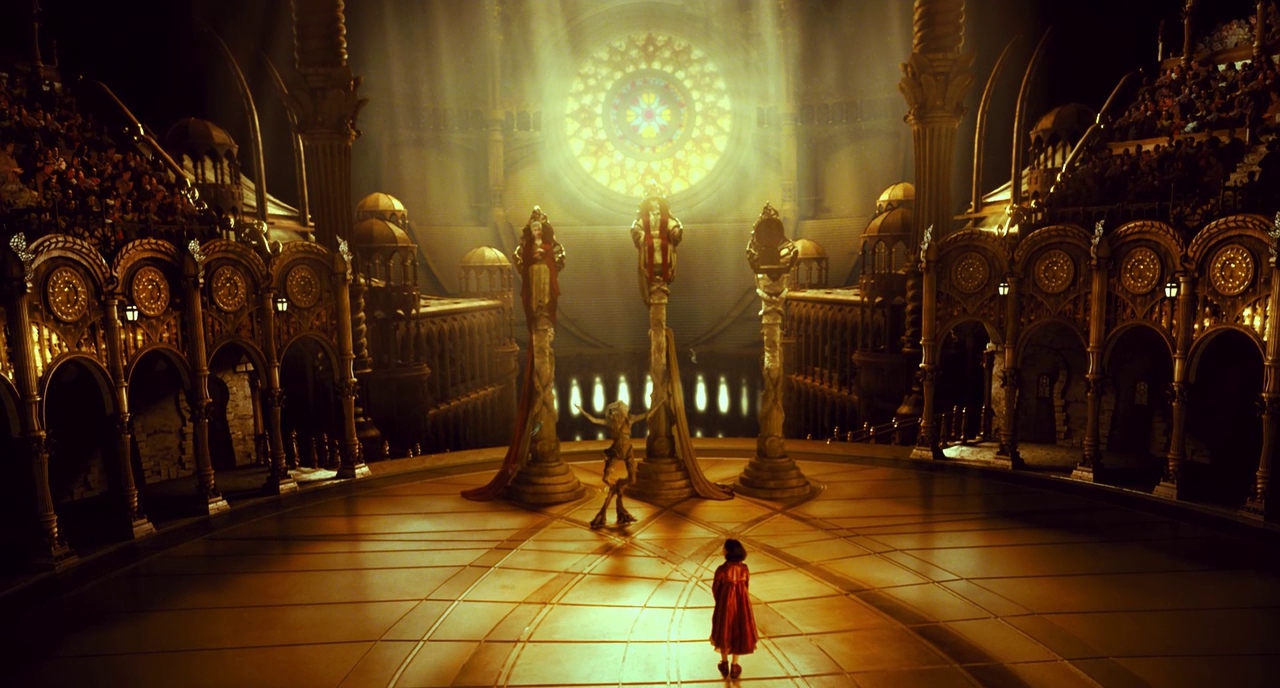 The Damsel in Distress Trope Explored: From Fairy Tales to Modern Movies 10 A young girl in a red dress stands in a golden-lit chamber before three towering thrones, bathed in light from a stained glass window.