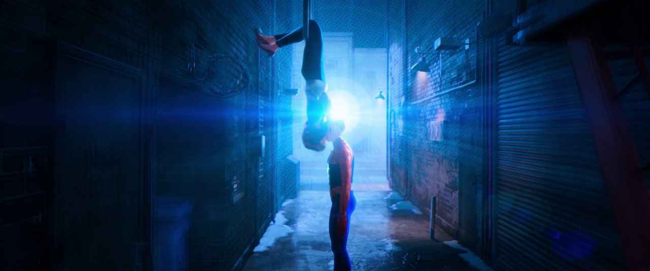 What Is a Story Mountain? Definition & Film Examples 3 Spider-Man stands in an alley about to kiss a woman hanging upside-down, lit by a bright lens flare behind them