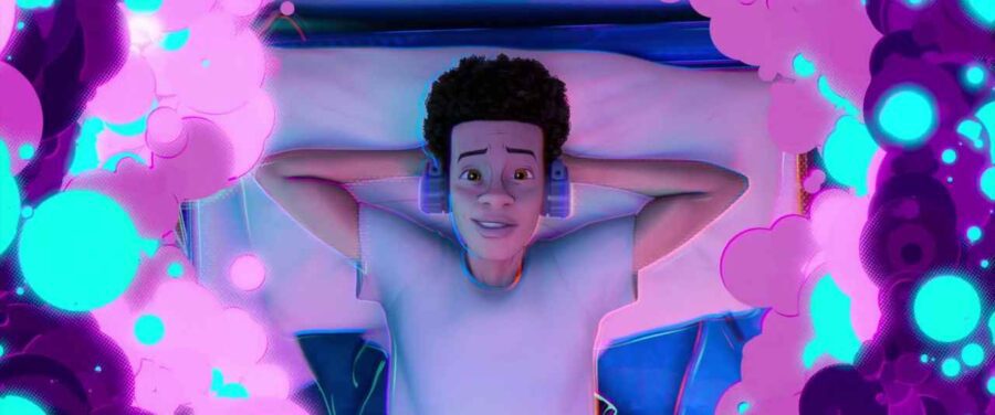What Is a Story Mountain? Definition & Film Examples 7 Miles Morales smiles while lying on his bed with headphones, surrounded by glowing pink and blue portal energy
