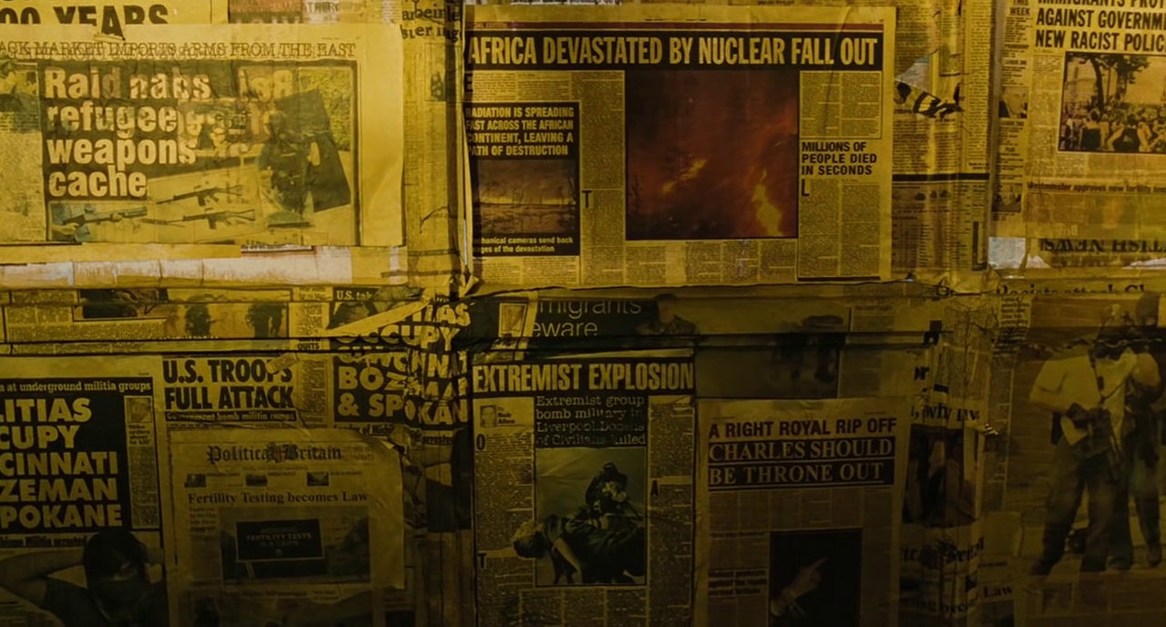 What Is World Building in Movies? Definition, Meaning & Examples 9 A dimly lit wall covered in old newspaper clippings with headlines about war, nuclear fallout, militias, and extremist attacks.