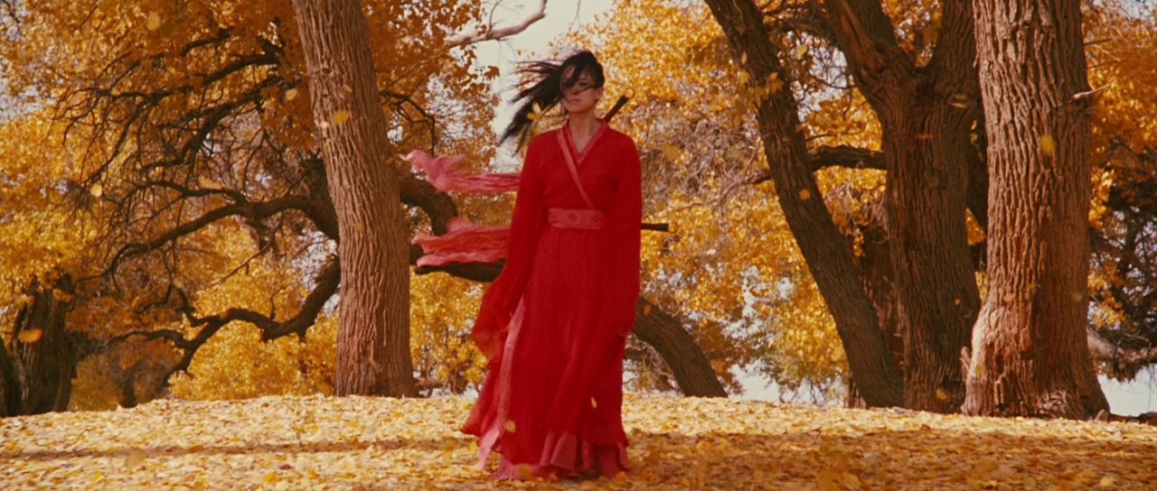 What Is a Focal Point in Art? Definition and Film Use 5 Flying Snow, dressed in red, walks through a golden forest with leaves falling around her.