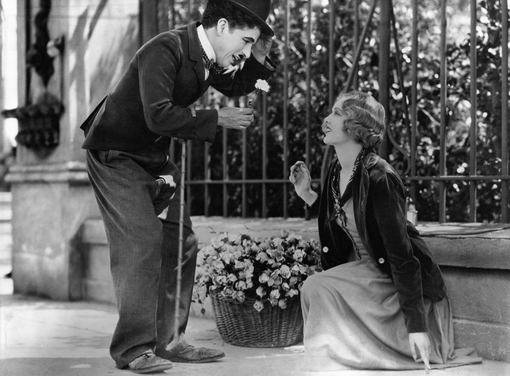 What Is a Take in Film? Definition, Purpose +Famous Examples 4 The Tramp smiles and offers a flower to a blind girl seated near a basket of roses