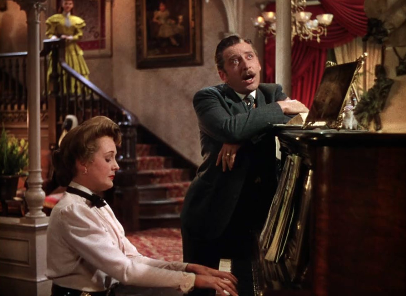 What Is the Studio System in Hollywood? How It Worked and Ended 4 Leon Ames, Mary Astor, and Lucille Bremer perform around a piano in a rich Technicolor set from Meet Me in St. Louis (1944)