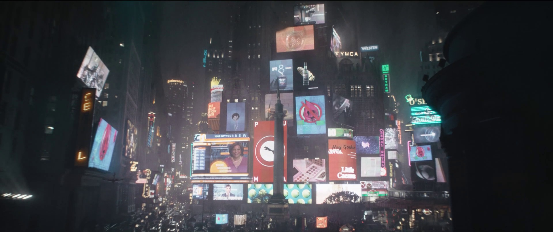 Settings Ideas and Examples for Film Scenes 2 Wide shot of Gotham’s version of Times Square, filled with digital billboards, neon lights, and a dense nighttime atmosphere