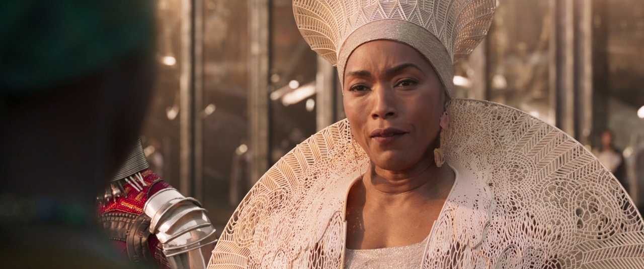 Cultural Studies in Film: How Movies Build Cultural Meaning 3 Queen Ramonda (Angela Bassett) in an ornate white headdress and wide lace collar, shown in close-up as she looks ahead with a serious expression.