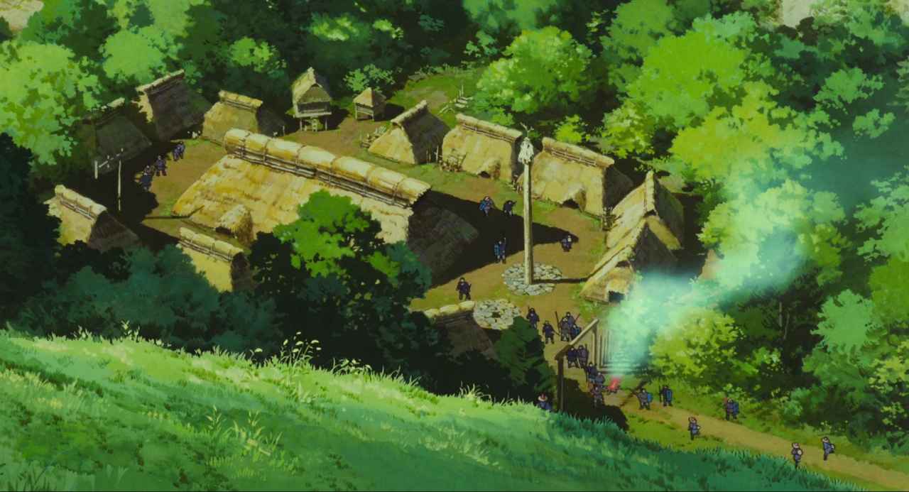 Ecocriticism in Film Studies: Theory, Methods, and Key Concepts 2 Bird's-eye view of Irontown's walled settlement surrounded by dense green forest in Princess Mononoke (1997), with a glowing blue projectile entering through the gate.