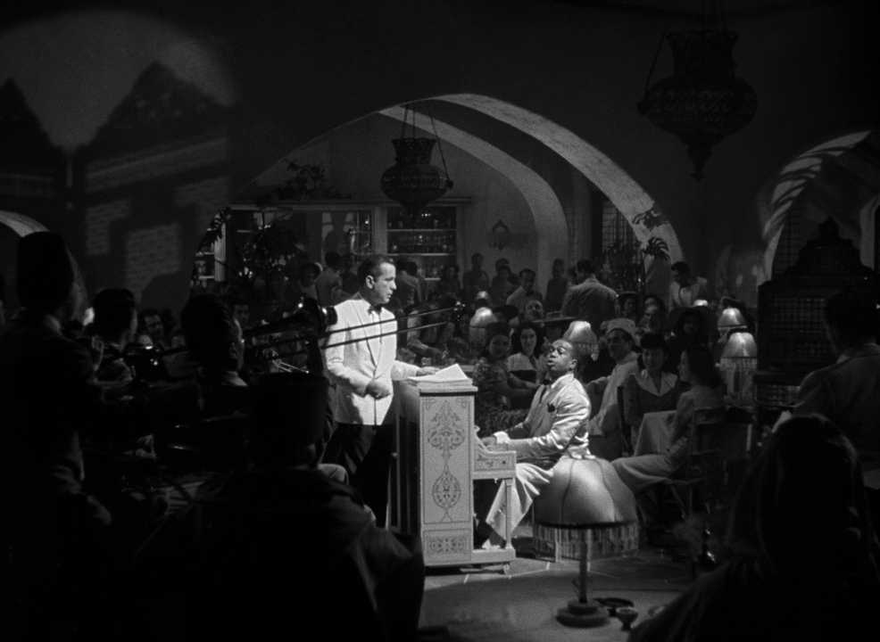 100+ Best Movie Quotes of All Time: The Definitive List 4 Humphrey Bogart as Rick Blaine standing over Dooley Wilson as Sam at the piano in Casablanca (1942)